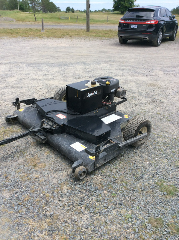 gas powered Tow behind mower Agri fab gas powered tow behind mower