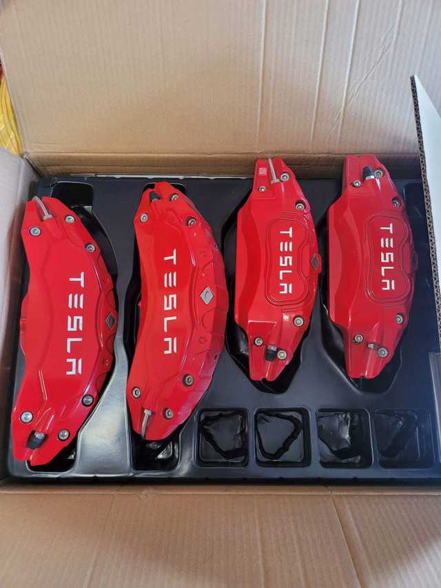 Tesla Model Y Caliper Covers Tesla Model Y Caliper CoversPut a cover