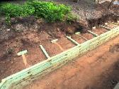 need help digging retaining wall