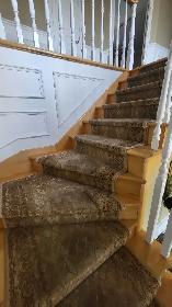 Installateur de tapis d'escalier