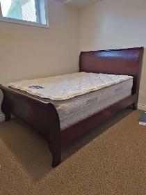 Queen size bed with mattress and box.