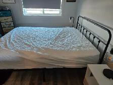 Queen bed frame, black metal.
