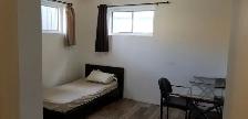 Large bright room at Legal basement, 15 minute walk to LRT