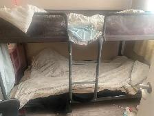 bunk bed with mattresses