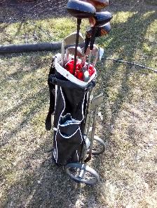 Golf clubs and 27 balls