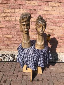PAIR OF CARVED WOODEN HEADS
