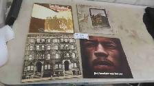 4 Rock Records : 3 Led Zeplin Records , 1 Jimmy Hendrix