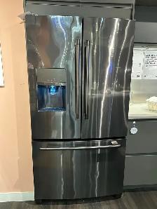 brand new black stainless fridge