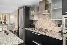 Furnished one bed and one den Downtown Victoria with parking lot