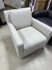 Natuzzi leather swivel arm chair