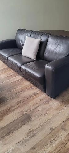 2 sofas 1 brown leather 1 beige micro fiber$500 for both