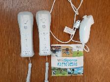Nintendo Wii Controllers And Wii Sports Game
