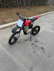 Fixing/tightening chain on dirt bike