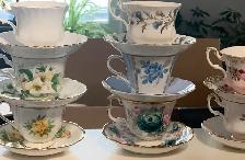 assorted fine china tea cups and saucers