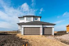 Spacious Modern Home with Triple Car Garage & Expansive Pie Lot!