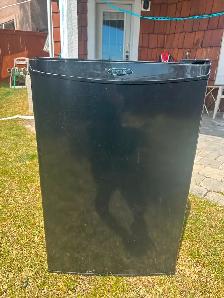 A mini 3.3 CU.FT. used Danby fridge black colour