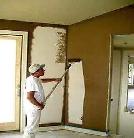 drywall repair painter looking forward 4034311925