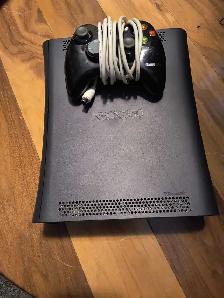Grey Xbox 360 with controller