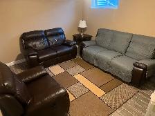 Dark brown leather recliner couch and love & chair seat. Used In