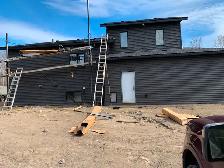 A siding installer