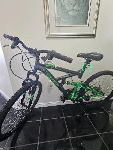 Huffy Rock Creek mountain bike.  26-inch wheels.