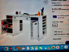 Desk with custom glass top. Lots of storage for crafting also