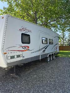 2007 KZ Sportsmen Sportster 32' Toy Hauler – Triple Axle