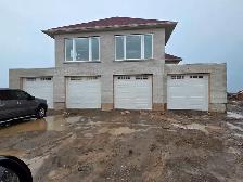 BRAND NEW GARAGE DOORS AND GARAGE DOOR OPENERS