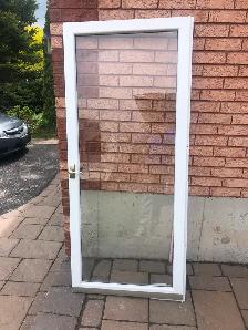 Glass storm door