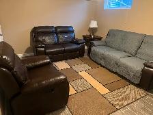 Dark brown leather recliner couch and love & chair seat.