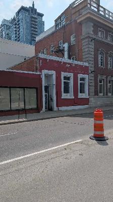 16ft brick wall needs painting downtown