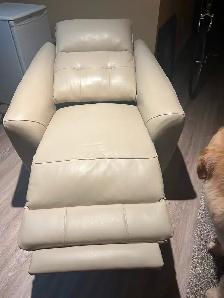 Genuine leather love seat and chair.