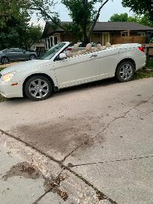 2010 Sebring hard top convertible 27000 km