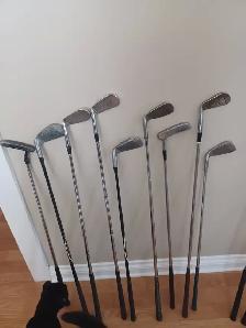 Various Golf Clubs and Bags