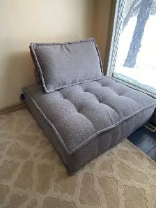 Grey fabric floor chair