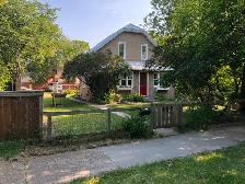 Rustic riverfront centennial house seine river st boniface