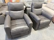 Pair of grey leather swivel rocking power recliners
