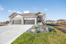 Beautiful 1360sqft Bungalow w/ full bsmt & dbl-attached garage!
