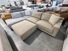 Beige fabric sectional with ottoman