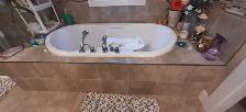 Need a plumber/handyman to repair my bathtub.