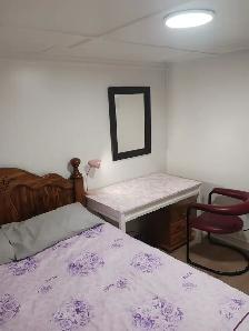 A BRAND-NEW private day room with a queen-size bed