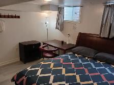 A brand new private day room with a queen-size bed