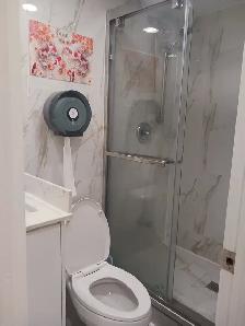 A brand new private day room with a queen-size bed