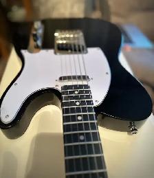 Fender T style electric guitar