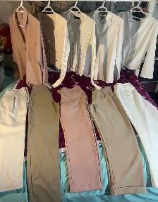 Womens clothing.  Tops long sleeves and pants- leggings, skirts.