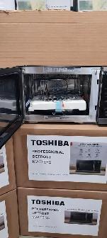 SUPER SALE ON TOSHIBA 7 IN 1 1.0 CU FT MICROWAVE WITH AIR FRYE