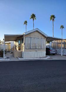 PARK MODEL W 2 PAVED PARKING AND PATIO AREAS