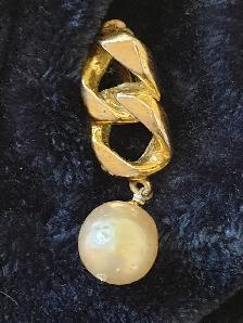 Authentic Pearl Chanel earrings with a 'Chanel France' hallmark