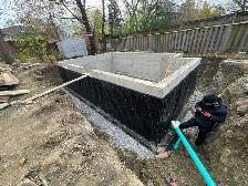Concrete footing and foundation wall