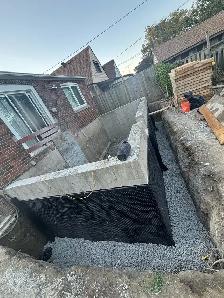 Concrete footing and foundation wall - Photo 9